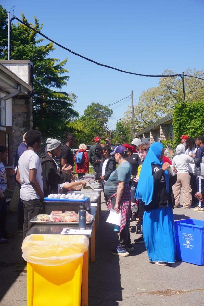 Food science major students selling food to customers 