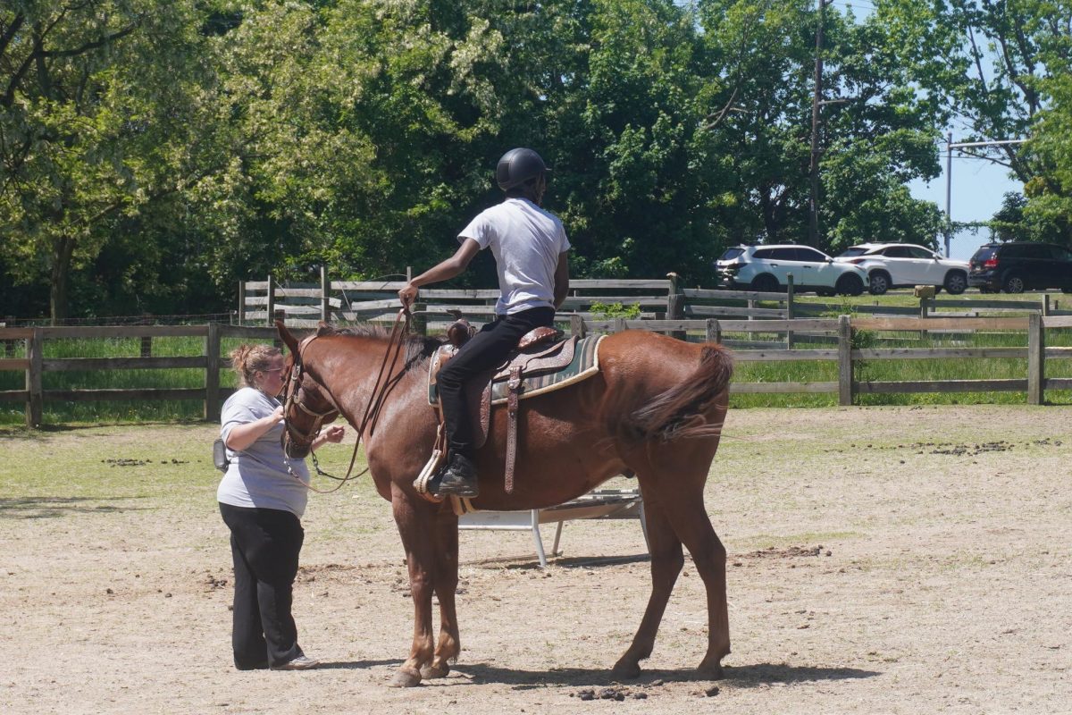 Saul students riding horse as demonstration